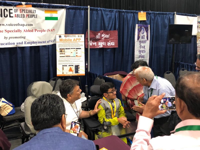 Sparsh Shah at VOSAP Booth, inspiring Jain community leaders