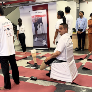 image of disabled man doing yoga